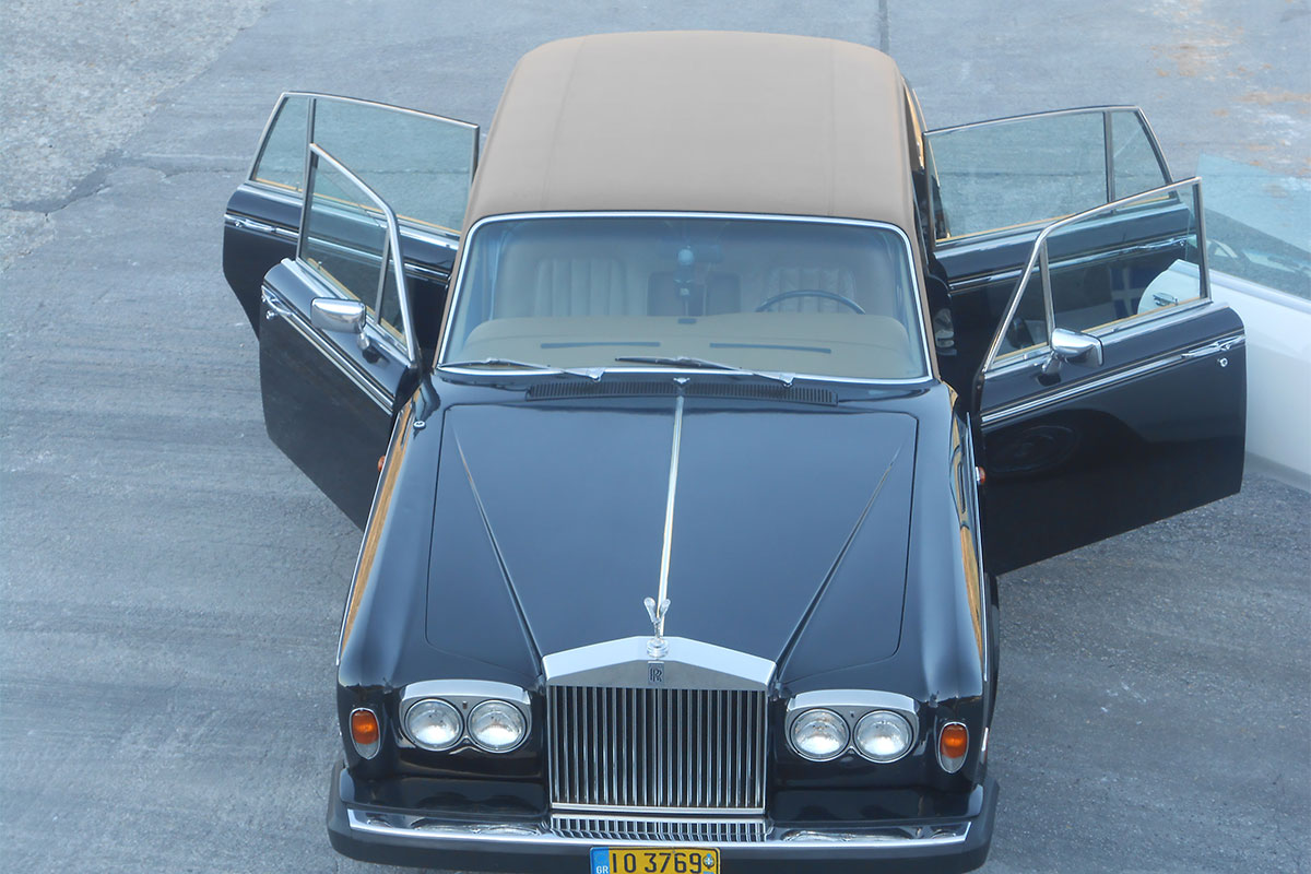 Transportation with an antique car at Sifnos