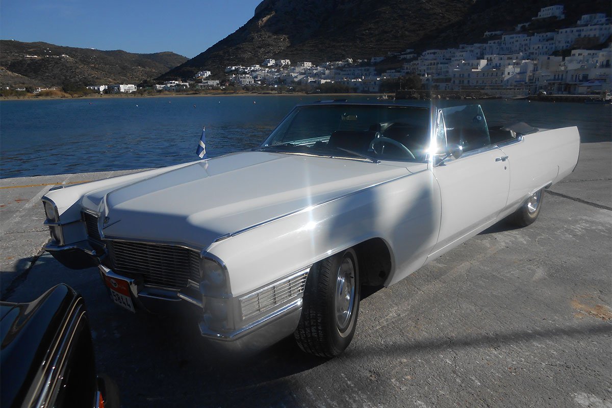 Transportation with an antique car at Sifnos