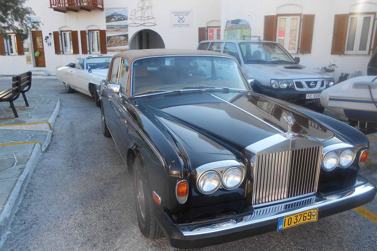 Transportation with an antique car at Sifnos