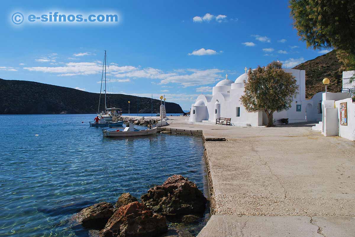 Church of Taxiarhis and the small mooring pier of Vathi